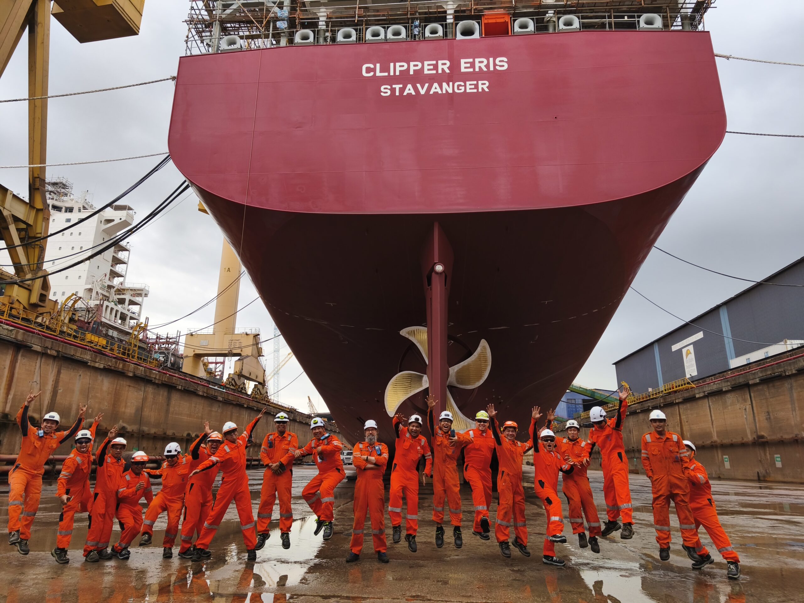 1743776930669 Crew in front of dry-docked vessel Clipper Eris