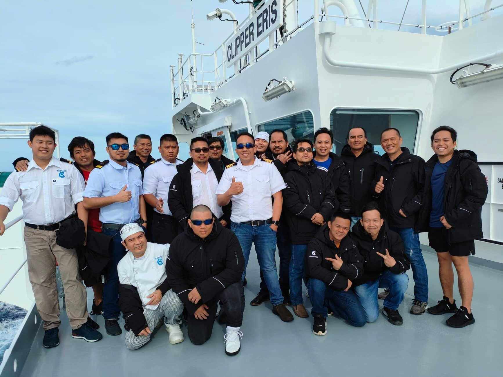 Christian-Gonzaga-interview1-3 Captain Christian Gonzaga on board Clipper Eris flanked by (from the left) 3rd mate Terrence Jay Piola, 2nd engineer Ronie Abig, 3rd mate Juan Miguel Flores, able seaman Gildo Paa, 2nd mate John Geoex Valenciano, commanding officer Siegfried Molina, cargo engineer Sesinando Concepcion, Capt. Gonzaga, fitter Fiel Catagcatag, Jonald Elec Soriano, 3rd engineer Edwin Buela, able seaman Gerry Lomboy, BSN Eddie Buayaban, 4th junior engineer Jay Rowell Camense. Sitting from the left chief cook Benjamin Dulay, OS Adrian Voltaire Ladringan, WPR Arnold Mijares, and able seaman John Rey Magamay.